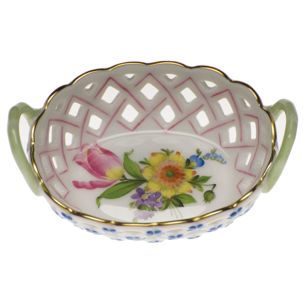 Hand-painted Herend Printemps Sm Openwork Basket with Handle in fine porcelain, 3.5in L X 2.5in W, on a white background