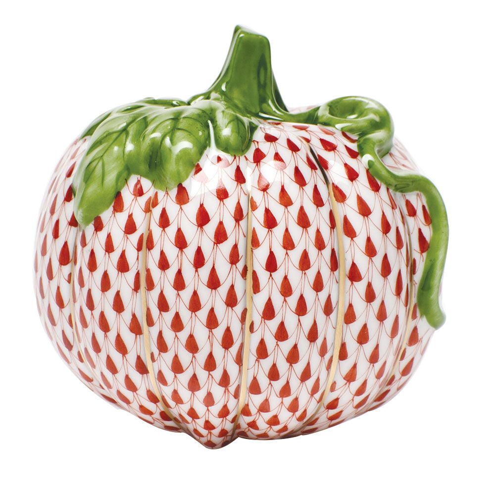 Hand-painted Herend Pumpkin Figurine in Rust fishnet porcelain on a white background