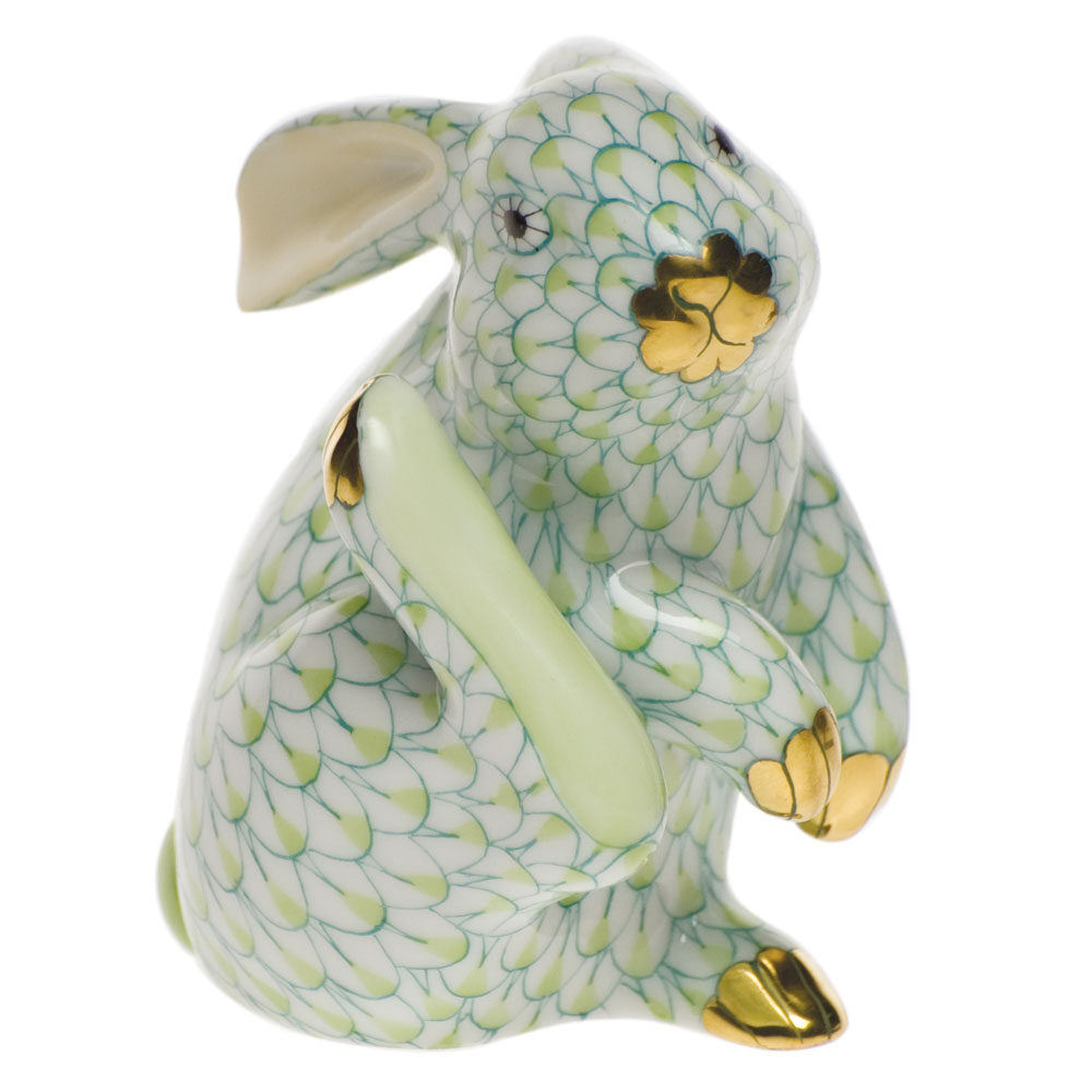Hand-painted Herend Scratching Bunny Figurine in Key Lime fishnet porcelain on a white background