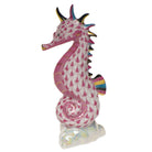 Hand-painted Herend Sea Horse Figurine in Raspberry fishnet porcelain on a white background