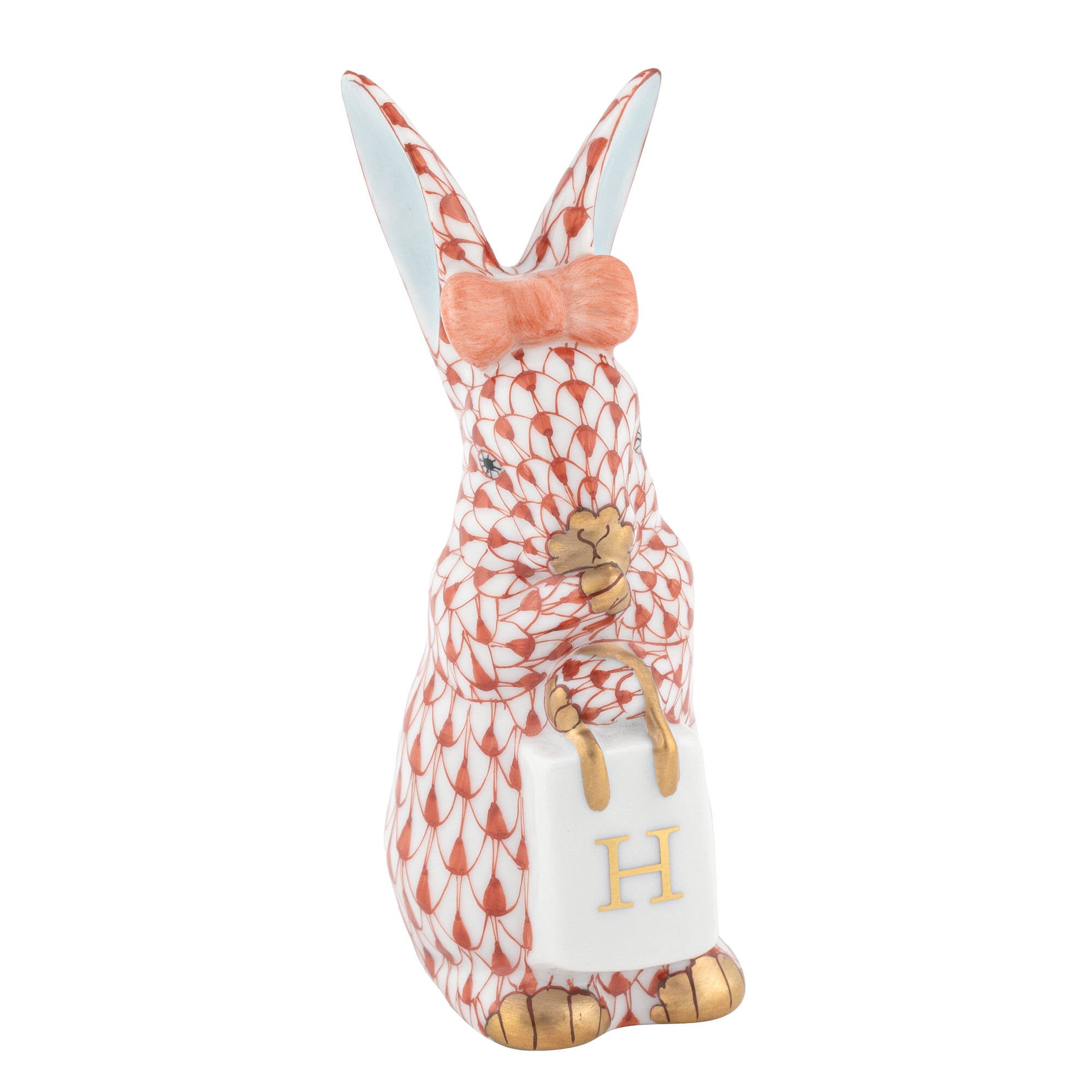 Shopping Bunny Figurine in hand-painted Rust porcelain by Herend of Hungary