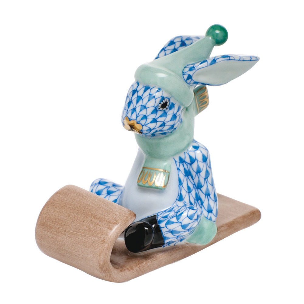 Herend Sledding Bunny Figurine porcelain figurine painted in the Blue fishnet pattern