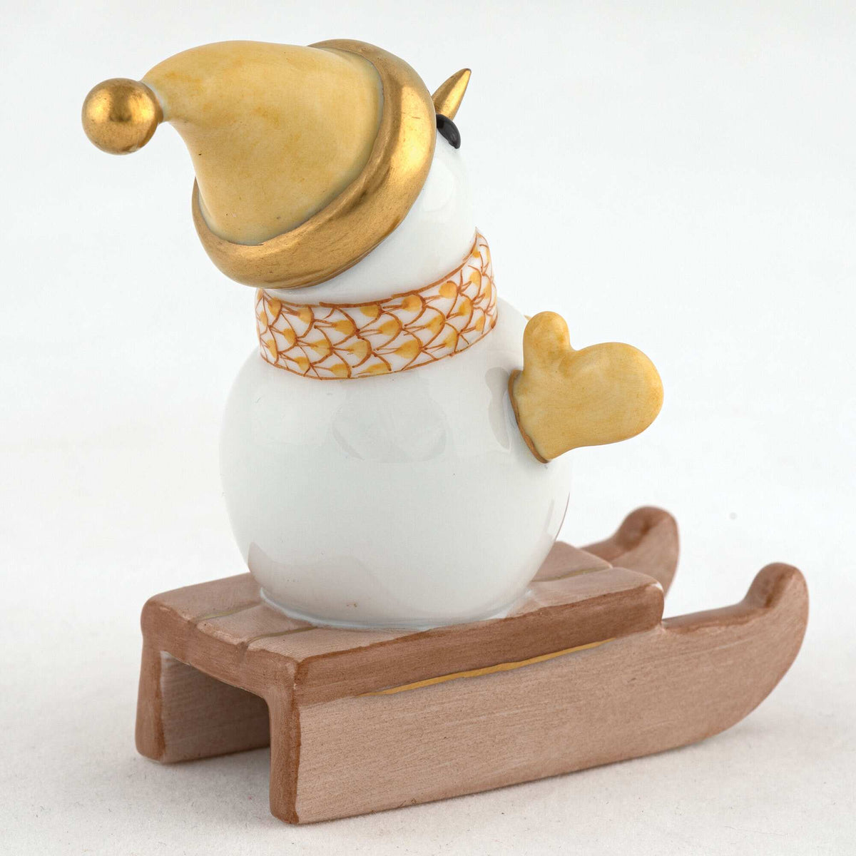 Herend Sledding Snowman Figurine – Butterscotch, alternate view