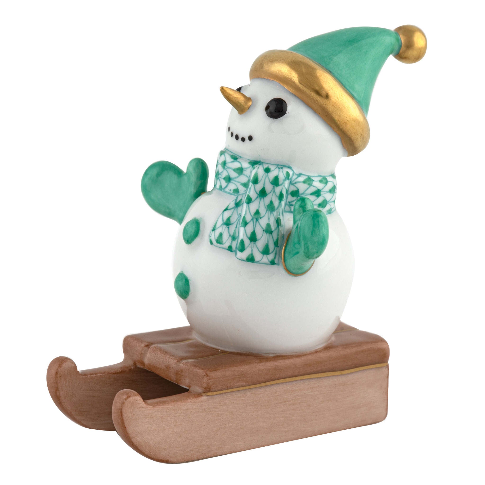 Hand-painted Herend Sledding Snowman Figurine in Green fishnet porcelain on a white background