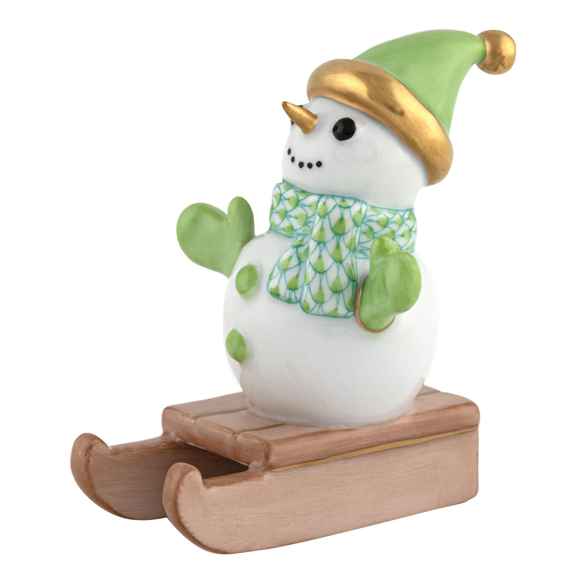 Herend Sledding Snowman figurine in Keylime with key lime green fishnet pattern with gold accents on a white background