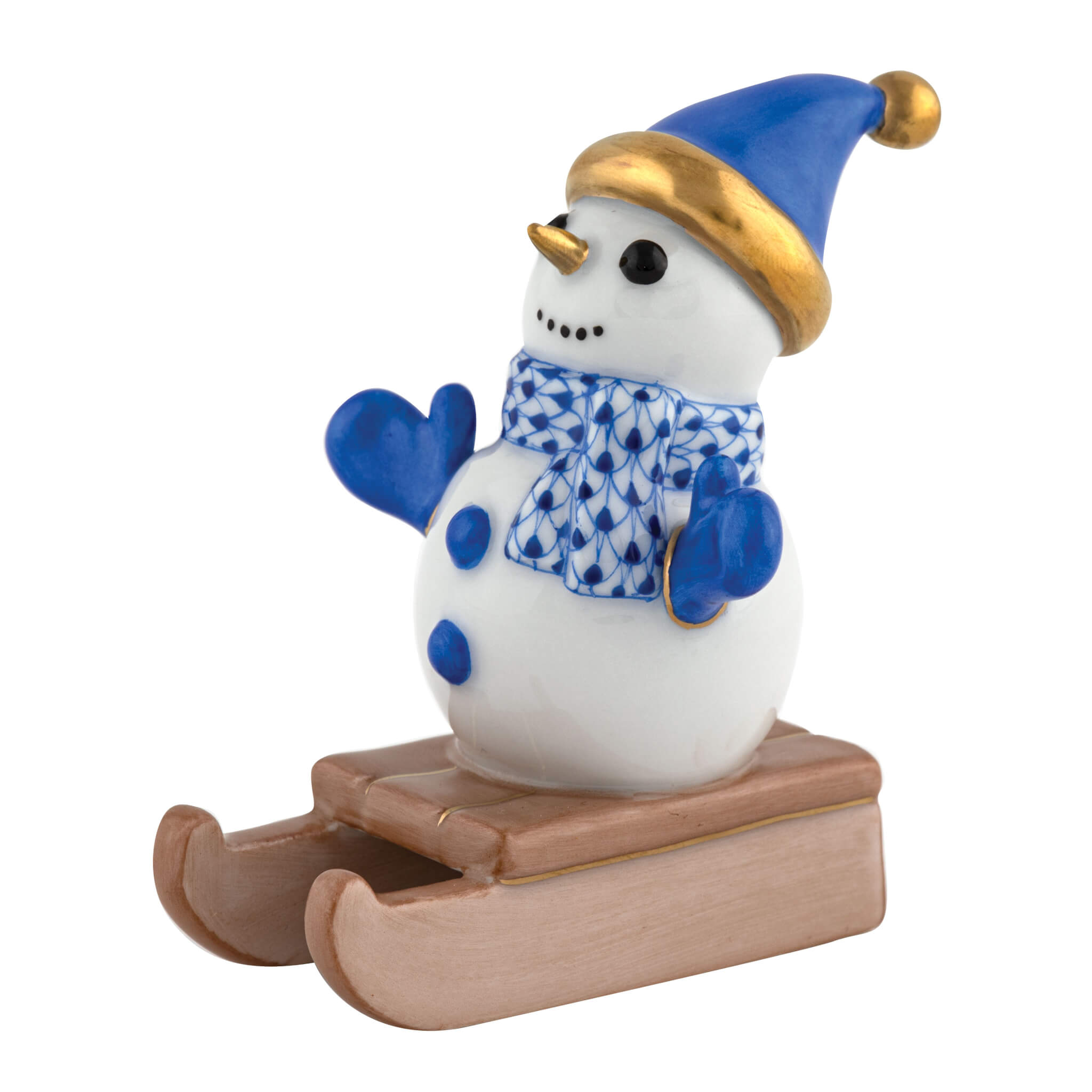 Herend Sledding Snowman figurine in Sapphire with deep sapphire blue fishnet pattern with gold accents on a white background