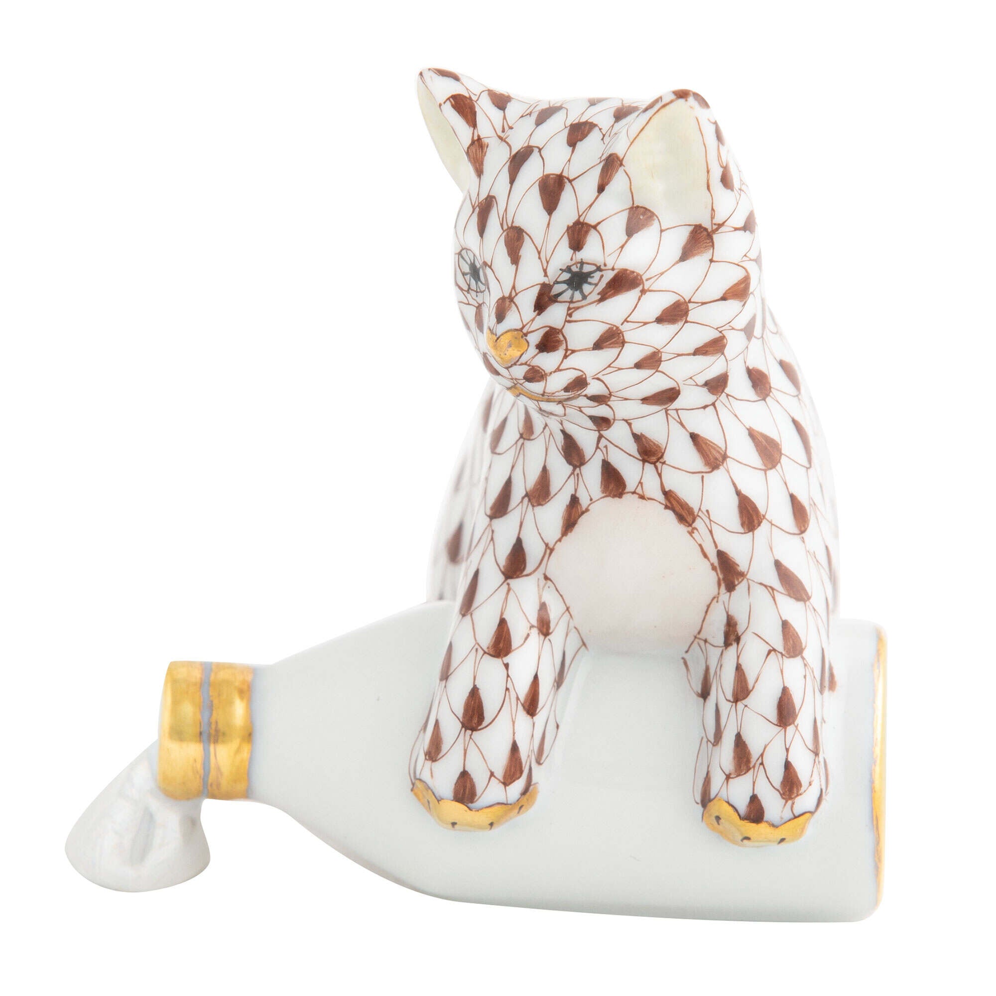 Hand-painted Herend Spilled Milk Figurine in Chocolate fishnet porcelain on a white background
