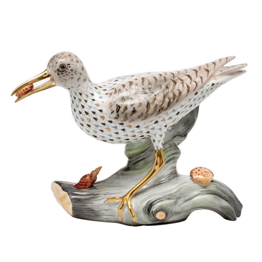 Hand-painted Herend Spotted Sandpiper on Driftwood Figurine in fine porcelain, 9in L X 6.25in H, on a white background