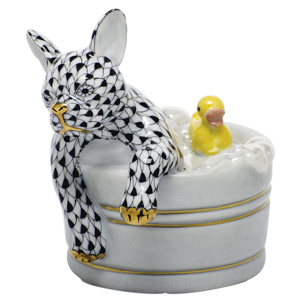 Hand-painted Herend Squeaky Clean Figurine in fine porcelain, 2.95in L X 3.25in H, on a white background