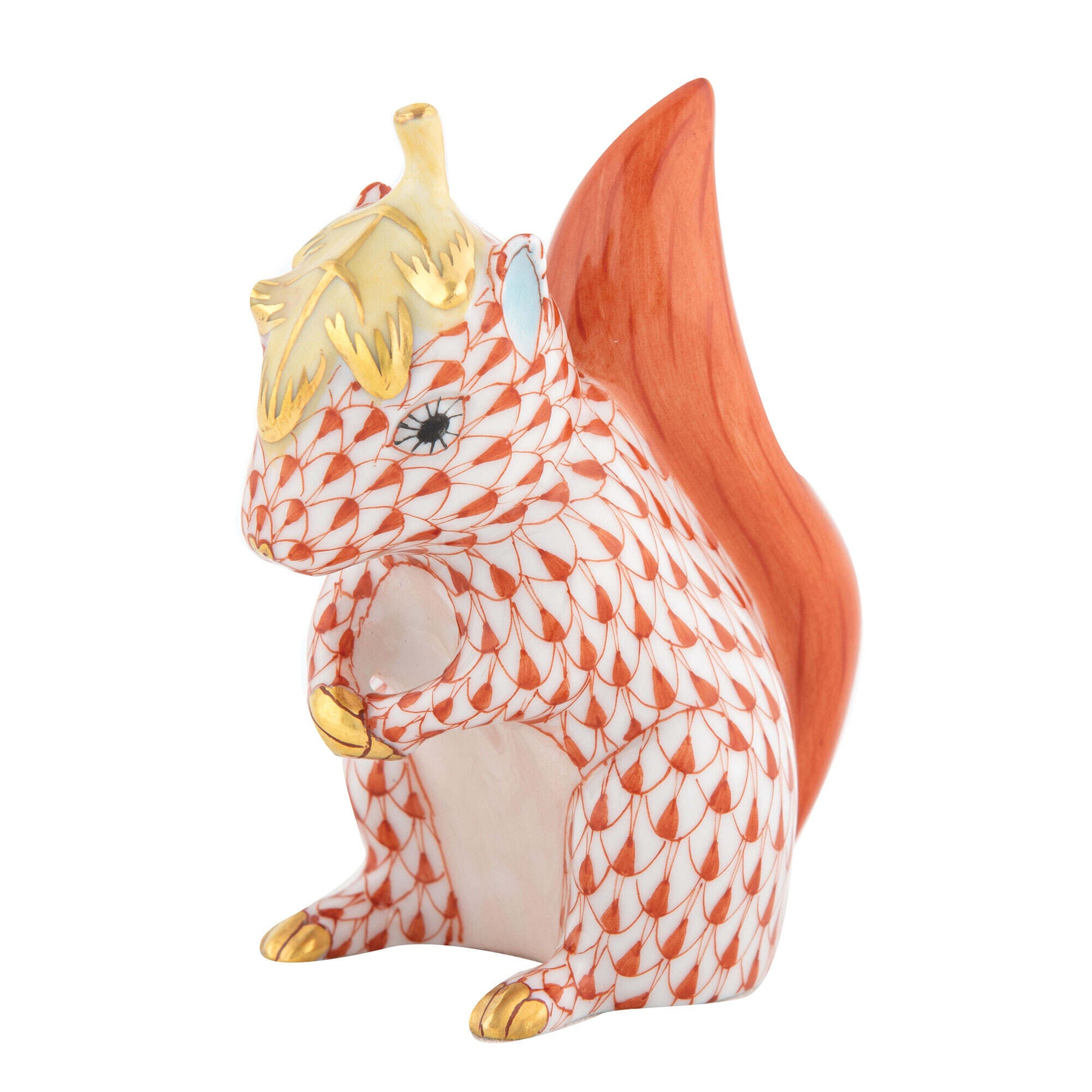 Hand-painted Herend Squirrel with Leaf Figurine in Rust fishnet porcelain on a white background