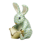 Hand-painted Herend Storybook Bunny Figurine in Key Lime fishnet porcelain on a white background