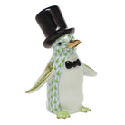 Hand-painted Herend Tuxedo Penguin Figurine in Key Lime fishnet porcelain on a white background