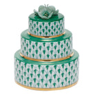 Hand-painted Herend Wedding Cake Figurine in Green fishnet porcelain on a white background