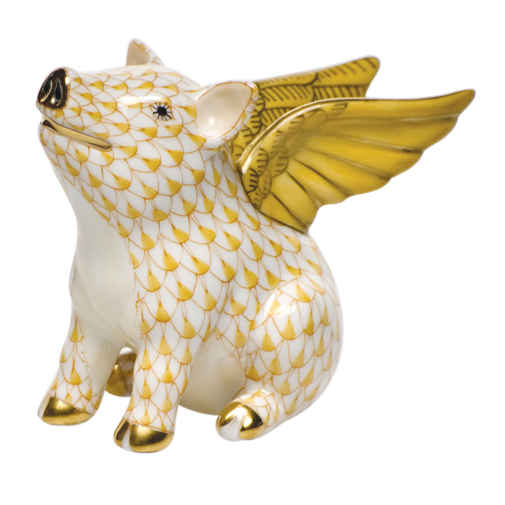 Hand-painted Herend When Pigs Fly Figurine in Butterscotch fishnet porcelain on a white background