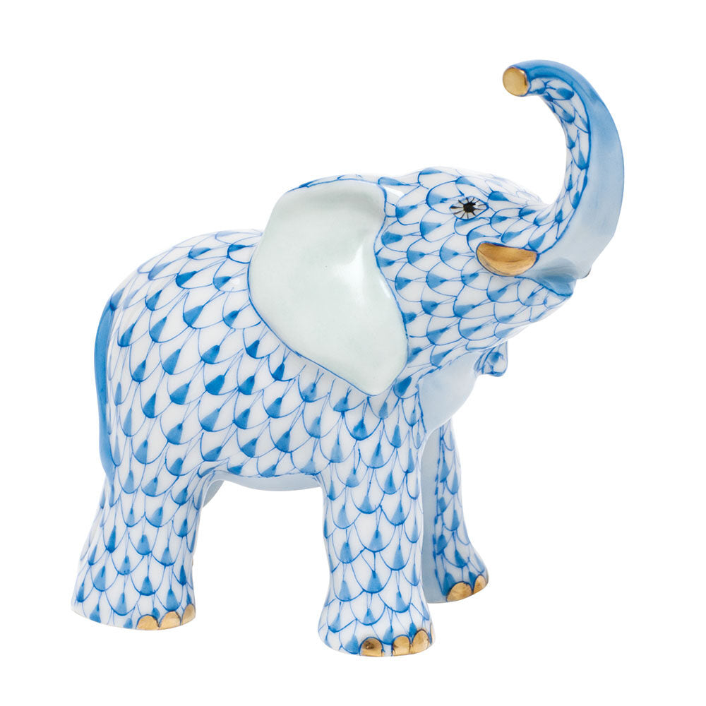 Hand-painted Herend Young Elephant Figurine in Blue fishnet porcelain on a white background