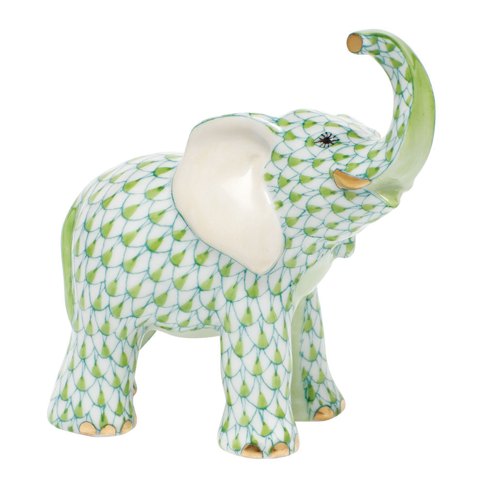 Hand-painted Herend Young Elephant Figurine in Key Lime fishnet porcelain on a white background