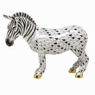 Hand-painted Herend Zebra Figurine in fine porcelain, 4in H X 5in L, on a white background