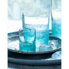 Moser Whisky Set Pebbles Shot Glasses 60 ml, Set of 6 Colors in a styled setting